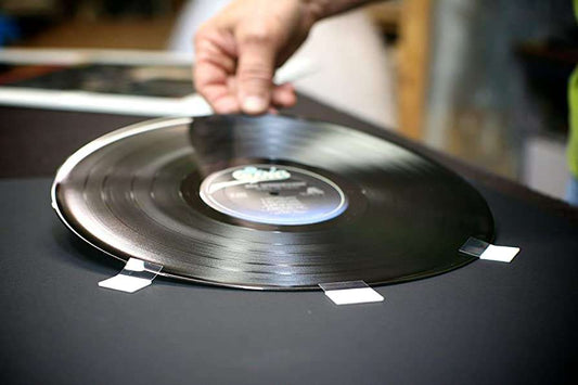How many minutes can an LP record hold per side?