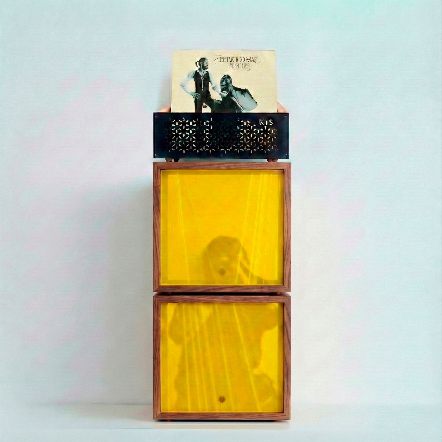 Stacked modular vinyl record storage furniture units designed for organizing LP collections.