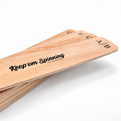 Set of plywood vinyl record dividers showing letter pairs and the Keep 'em Spinning logo