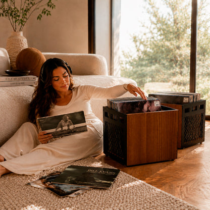 Two solid wood vinyl record crates side by side holding a 120-LP collection