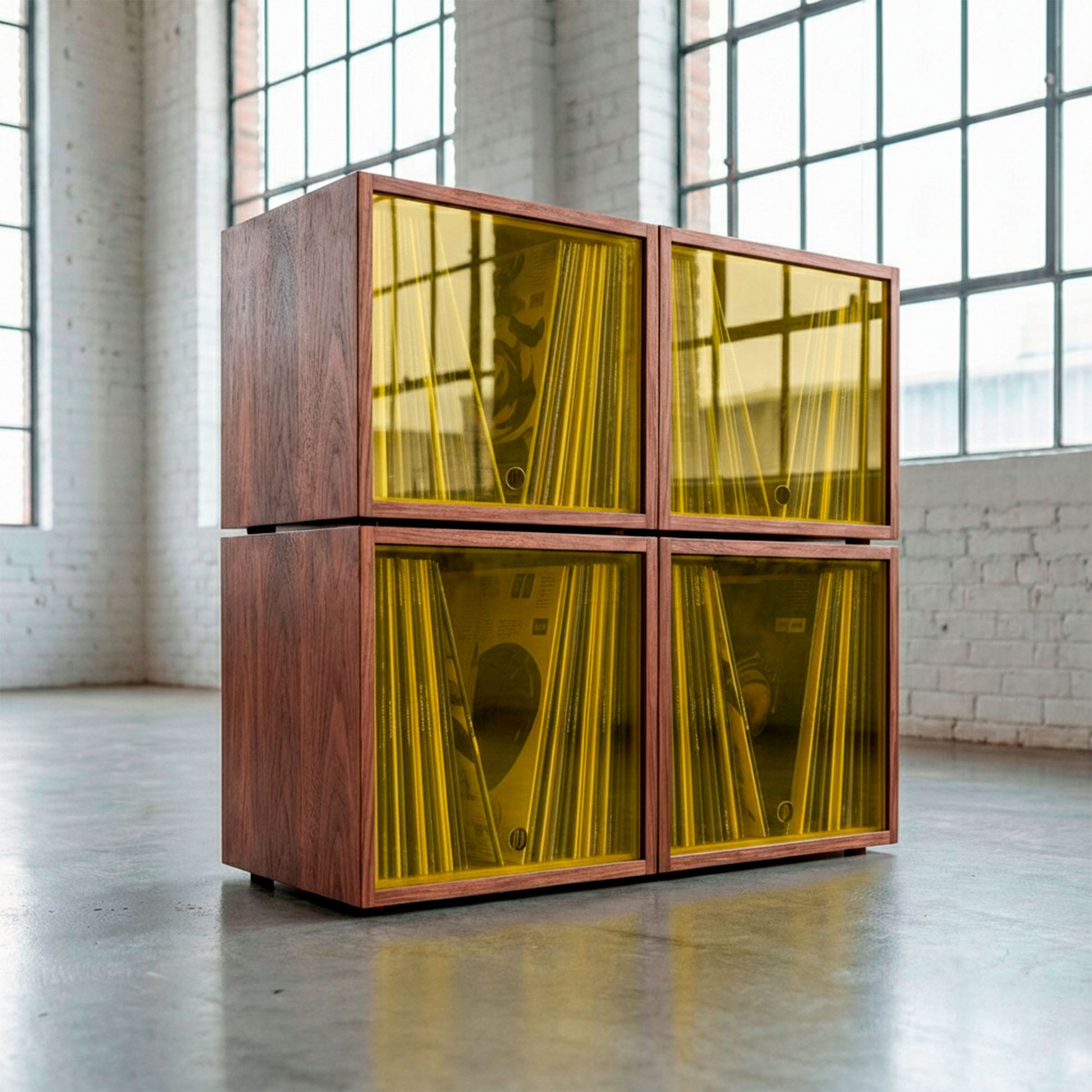 Modular walnut vinyl record storage cabinet with yellow-tinted glass doors and four storage cubes.
