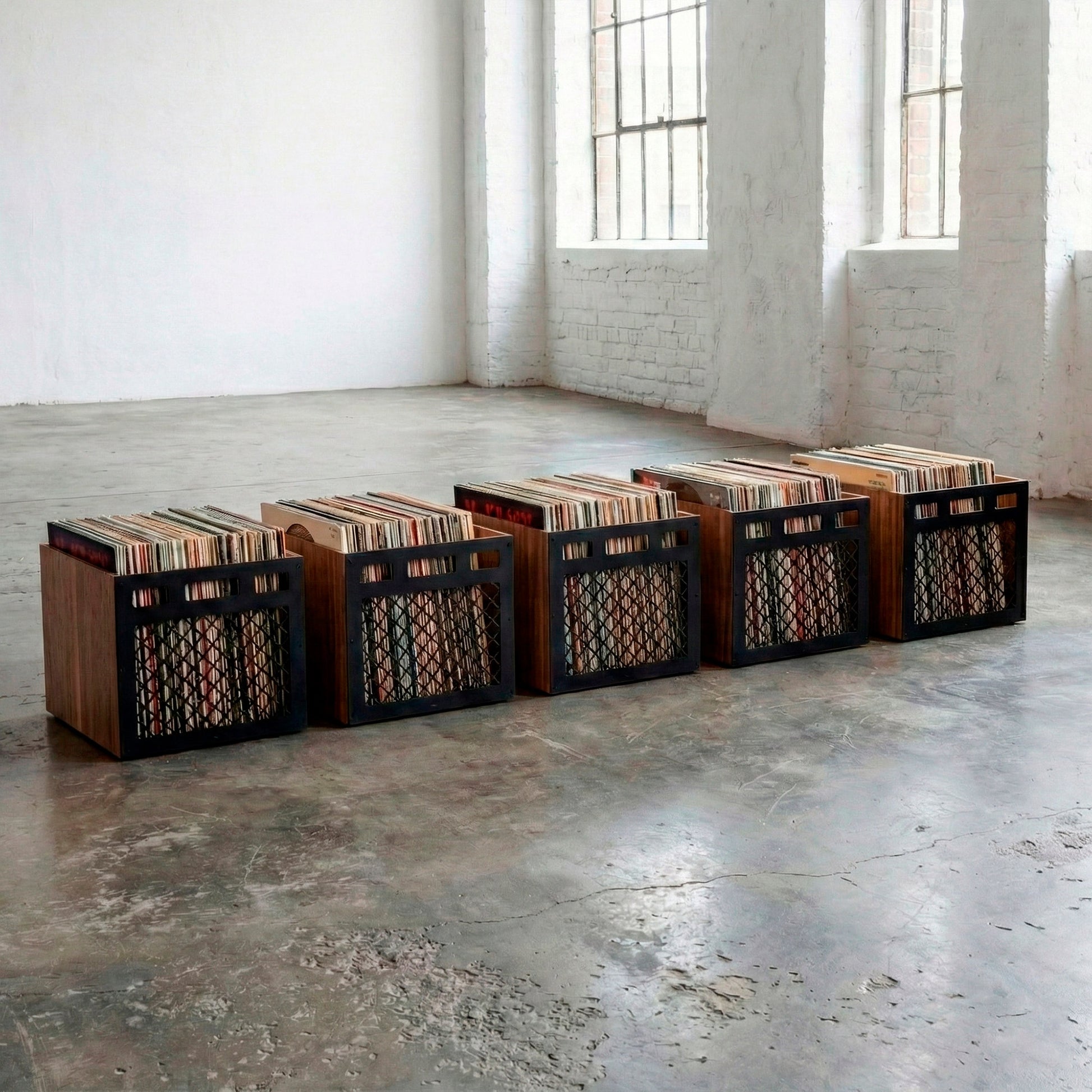 Five Classic Box wooden vinyl record crates arranged in a row on hardwood floor showing natural wood finish